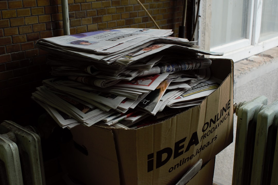 team-03 a pile of newspapers